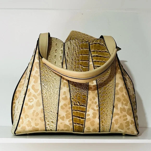 Beige top handle vegan leather handbag with cheetah print and faux ostrich texture.