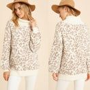 Wechseln Rollkragenpullover mit Leopardenmuster 1 Bild