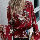 Wechseln Rote Boho-Bluse mit Schößchen und Blumenmuster 1 Bild