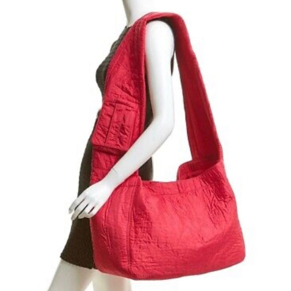 We The Free Oversized Puffer Sling Bag