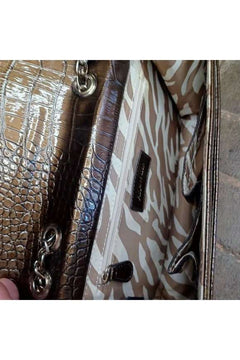 Metallic brown patent leather Anne Klein lion purse - Primrose Signature Boutique