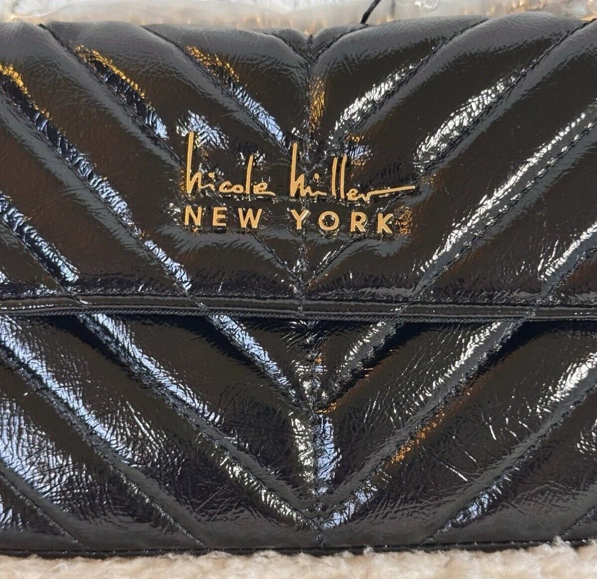 Nicole Mitchell Shimmering Quilted Black Crossbody Bag