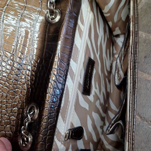 Metallic brown patent leather Anne Klein lion purse